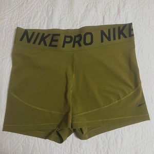 Army green Nike pro shorts